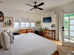 Relax in the bright & airy Ulu Suite! Enjoy the comfy bed & tropical touches for a perfect island escape. Book your stay!