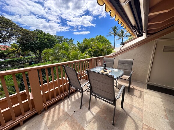 Lounge on your lanai surrounded by lush greenery and soothing sounds of nature.