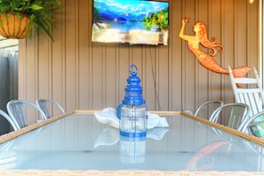 Enjoy meals al fresco on the covered back deck.