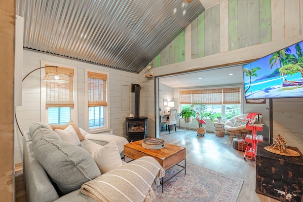 Youāll enjoy relaxing in the large living-room space with its comfy seating.
