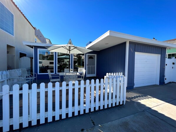 Front of cottage and access to garage.