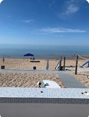 Patio right on the sand. 