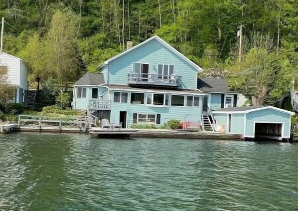 Lake view of house from one of the available kayaks.