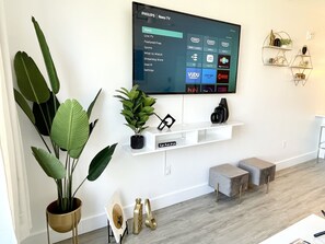 Contemporary Livingroom:
- 55” Smart TV 
- Sleeper Sofa
- City View