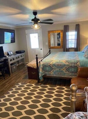 Bedroom w/ King bed.