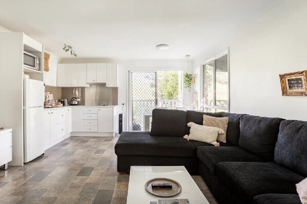 Open living dining kitchen area