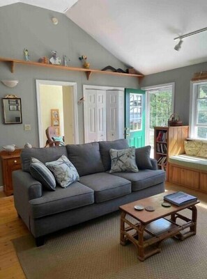 primary living room with new comfortable couch