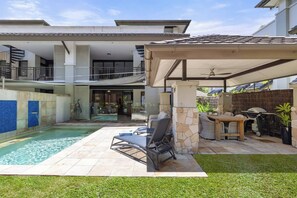 Step into this villa-style sanctuary, where your private pool, BBQ area, and seamless indoor-outdoor living await, alongside access to the resort facilities for a relaxing getaway.