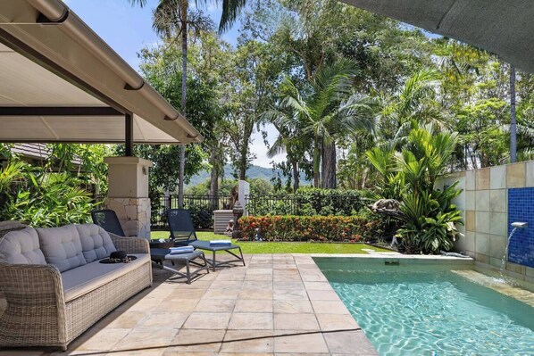Immerse yourself in the ultimate relaxation with your private heated plunge pool.