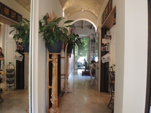 With your back to the livingroom looking down hallwy thru dining room to terrace