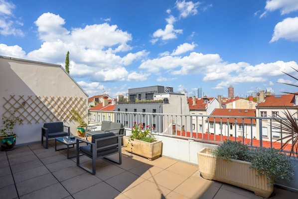 garden lounge area with panoramic view of Lyon