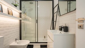 Rinse away the day's worries in our pristine shower oasis. #CleanSlate #BathroomBliss