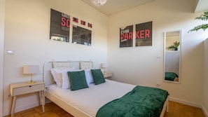 Simple elegance and quiet serenity define our second bedroom. #PeacefulNights #BedroomComfort