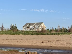 House from beach on the ocean dunes.