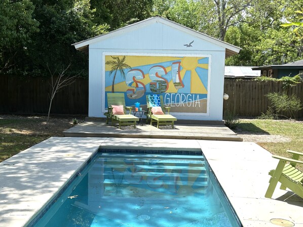 Pool shed with mural for memorable photos