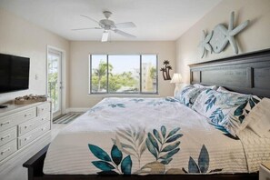 Nice and bright bedroom with tv