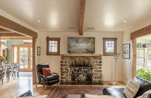 Living Room with Decorative Fireplace and LG Smart TV