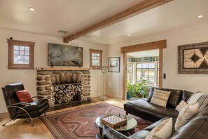 Living Room with Deccorative Fireplace and LG Smart TV