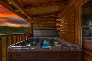 Relax in the bubbling hot tub after a fun day of adventure.