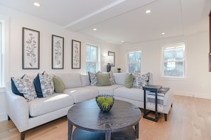 Living room with large section couch.