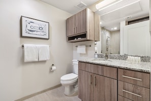 Freshen up and renew in the sleek bathroom with complimentary toiletries.