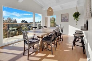 Serve your delicious meals easily at the  dining table with the gorgeous views