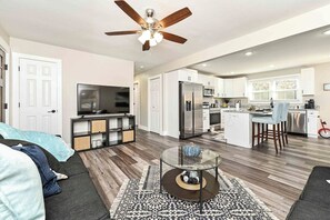 Open living room with large flatscreen for movie night:)