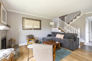 Downstairs living area. Futon can be pulled out to be a sleeper sofa.