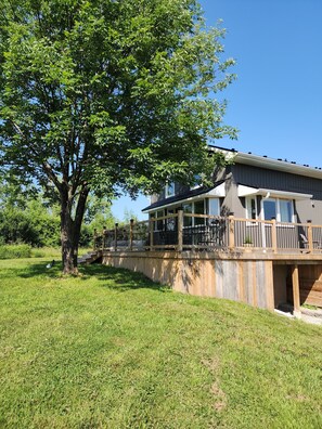 Enjoy an evening dinner on the back deck equipped with a BBQ.