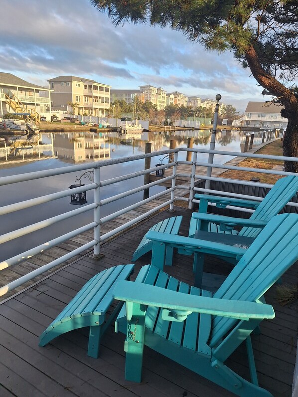 Adirondack seating with view of the canal from deck.