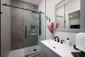 The spacious spa like main bathroom