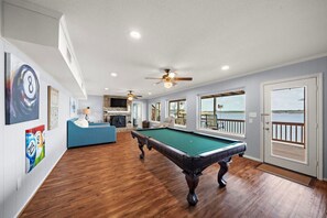 Enjoy this game room with a variety of games