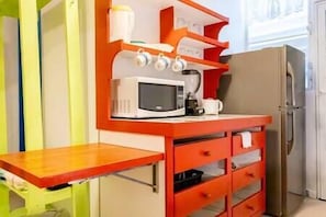 Includes electric pan, microwave, refrigerator, coffee maker. 