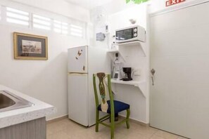 Full Kitchen with Fridge and Desk
