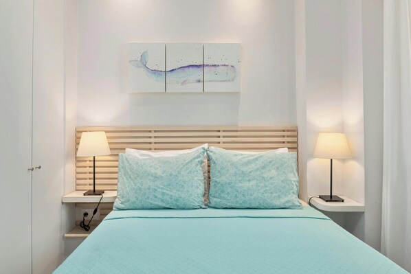 "Indulge in a peaceful night's sleep in our inviting double bed."