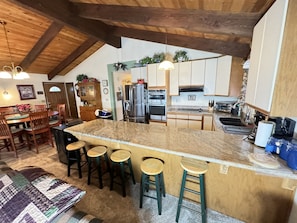 Great seating at the island and open area for family gatherings.