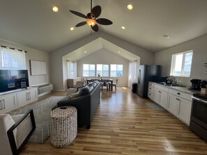 Living room with memory foam pull out sofa and smart TV