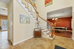 Entryway with double height ceiling.
