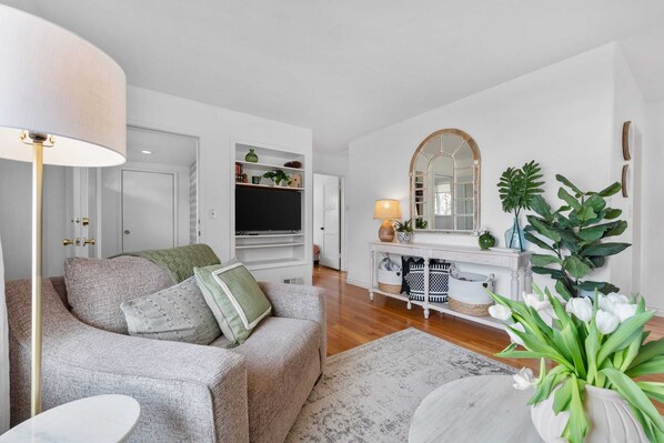 Stream your favorite TV shows and movies from the flat-screen Smart TV in the living room.