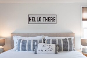 The master bedroom has an amazing king sized bed and high quality 100% cotton sheets. A small walk in closet and a dresser provide storage space.