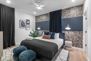 2nd Floor: 2nd bedroom with King bed, designer furnishings, and en-suite bathroom.