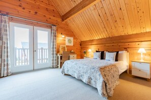 Hillview, Little Petherick, Padstow. First floor: The large bedroom hosts a sumptious king-size bed, wonderful Juliet balcony and an en-suite shower room