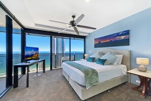 Main bedroom with king bed, smart TV, ocean views, block out blinds