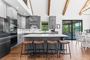 Open concept kitchen, living and dining on the main level. 