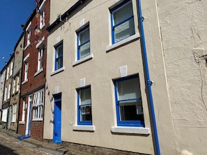 The historic street view of Ash Cottage, a Grade 2 listed building.