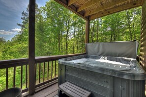 Relax in the hot tub at this romantic North GA Cabin Rental