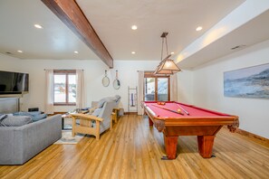 Challenge your group to a friendly game of pool, right from the comfort of our charming retreat.