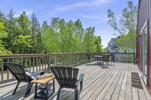 Scenic deck with seasonal mountain views