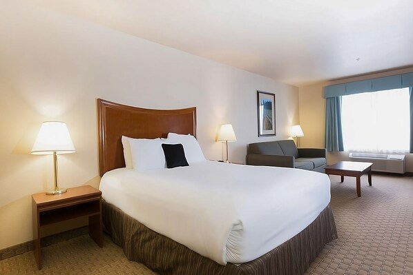 Comfortable Suite with a King bed and sofa bed.