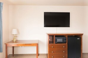 Our Junior Suite comes with a mini fridge & microwave, and a 55-inch flat-screen TV.